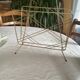 Vintage gold metal magazine rack