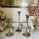 Art Nouveau style brass candlestick trio