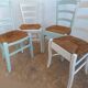 Suite de 4 chaises en bois et paille