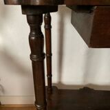 Old wooden pedestal table