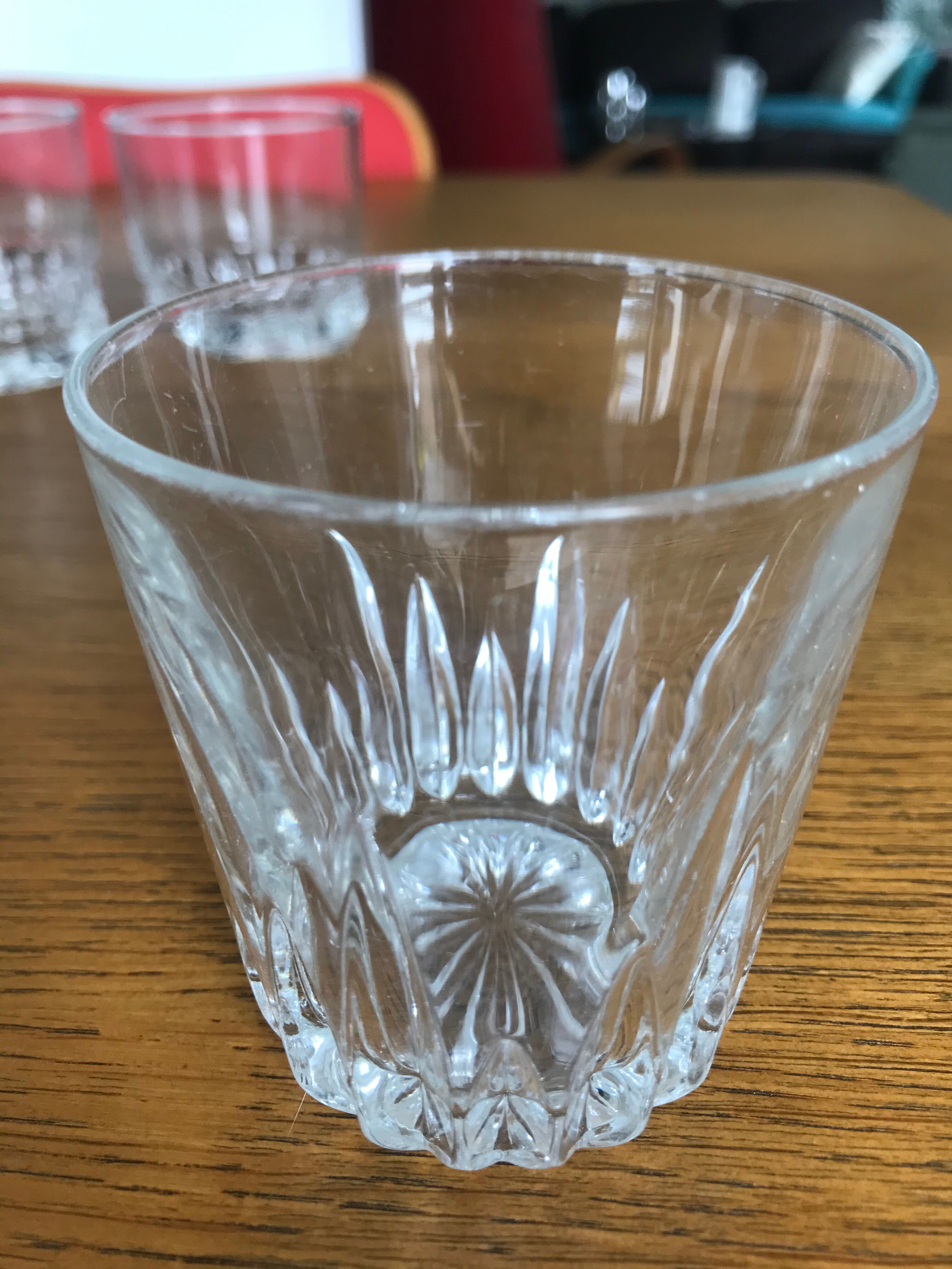 Mismatched decanter and whiskey glasses