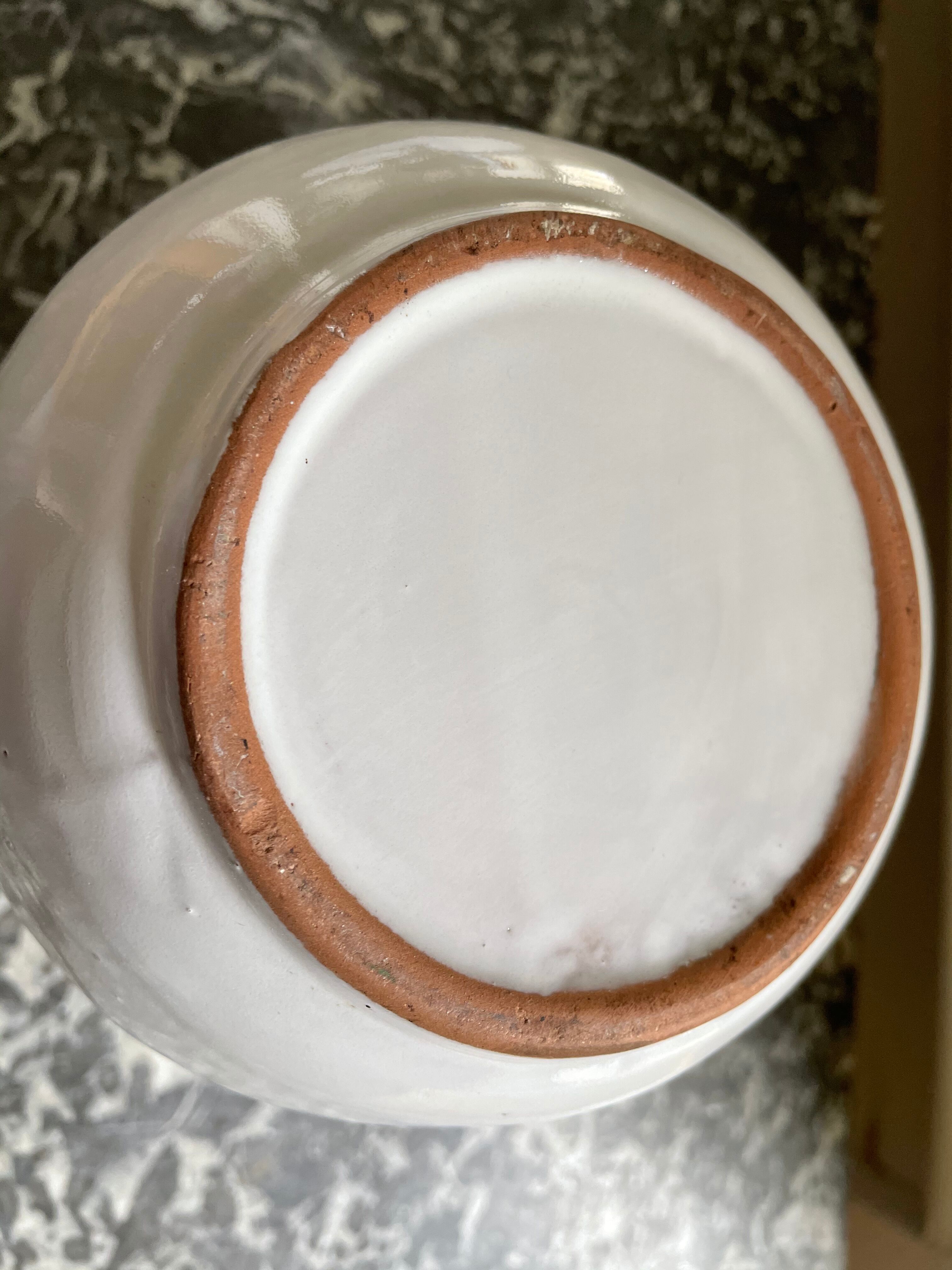 Pitcher in dabbling cherry decoration