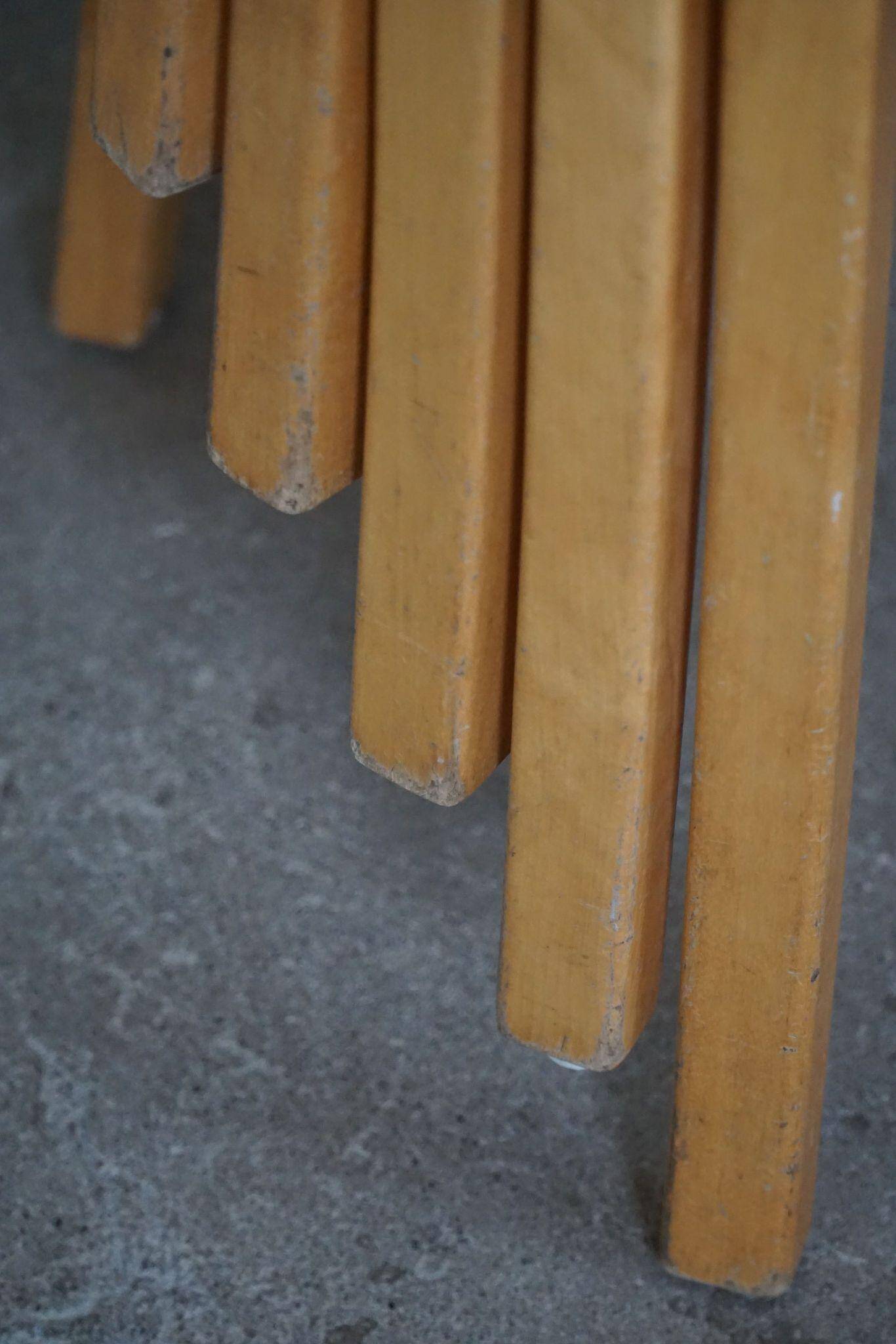 Modern Swedish, set of 14 stackable stools in birch and hessian fabric, 1980s.