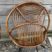 Paire de fauteuils en rotin, pieds métal CIRCA 1950