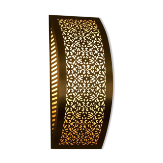 Moroccan brass wall light with intricate floral design