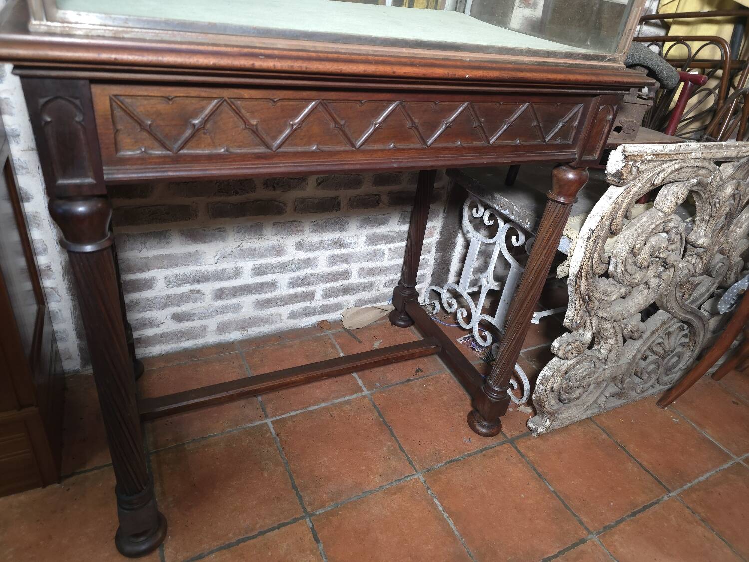 Antique display cabinet in 19th-century Gothic Revival style.