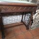 Antique display cabinet in 19th-century Gothic Revival style.