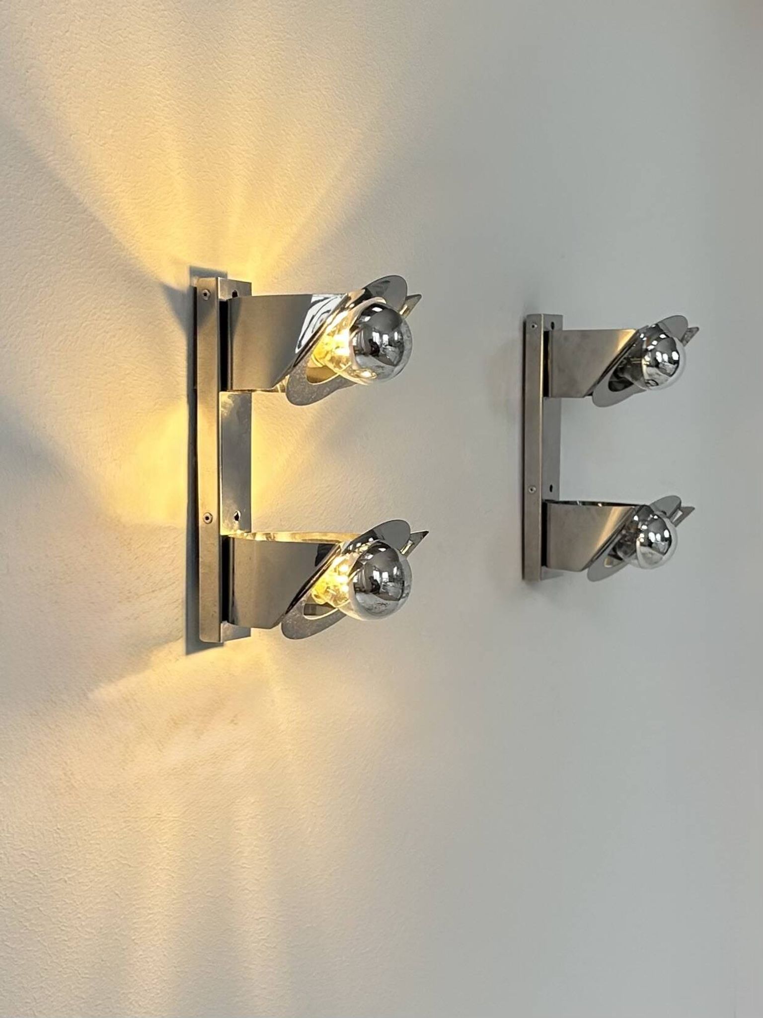 Pair of vintage wall lights, chrome metal, France, 1970.