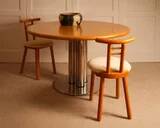 Circular dining table