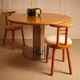 Circular dining table