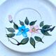 Stoneware dessert plates with floral decoration