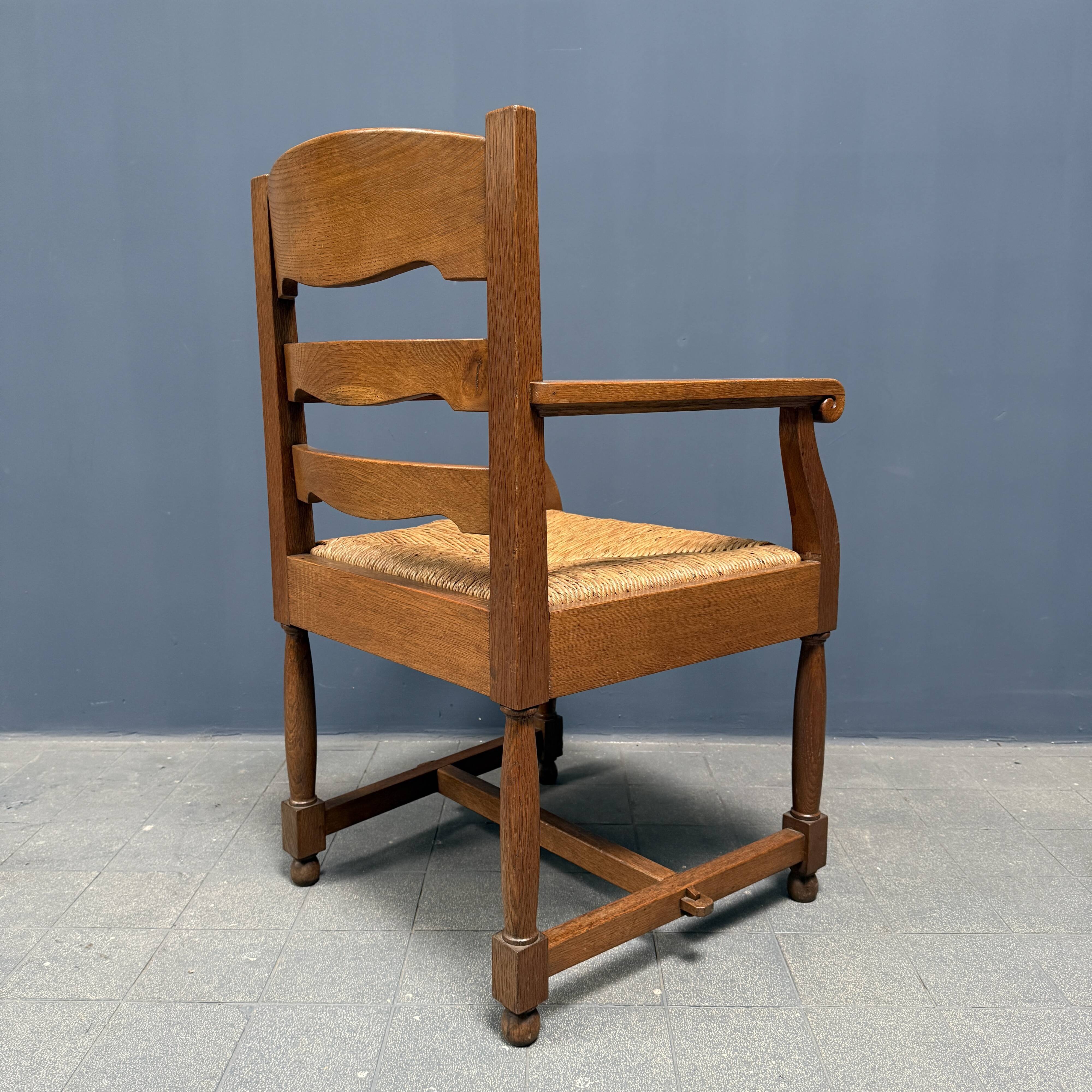 Set of two Dutch oak armchairs with rush seats
