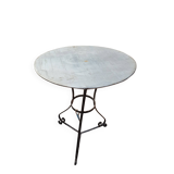 Round wrought iron and zinc bistro table