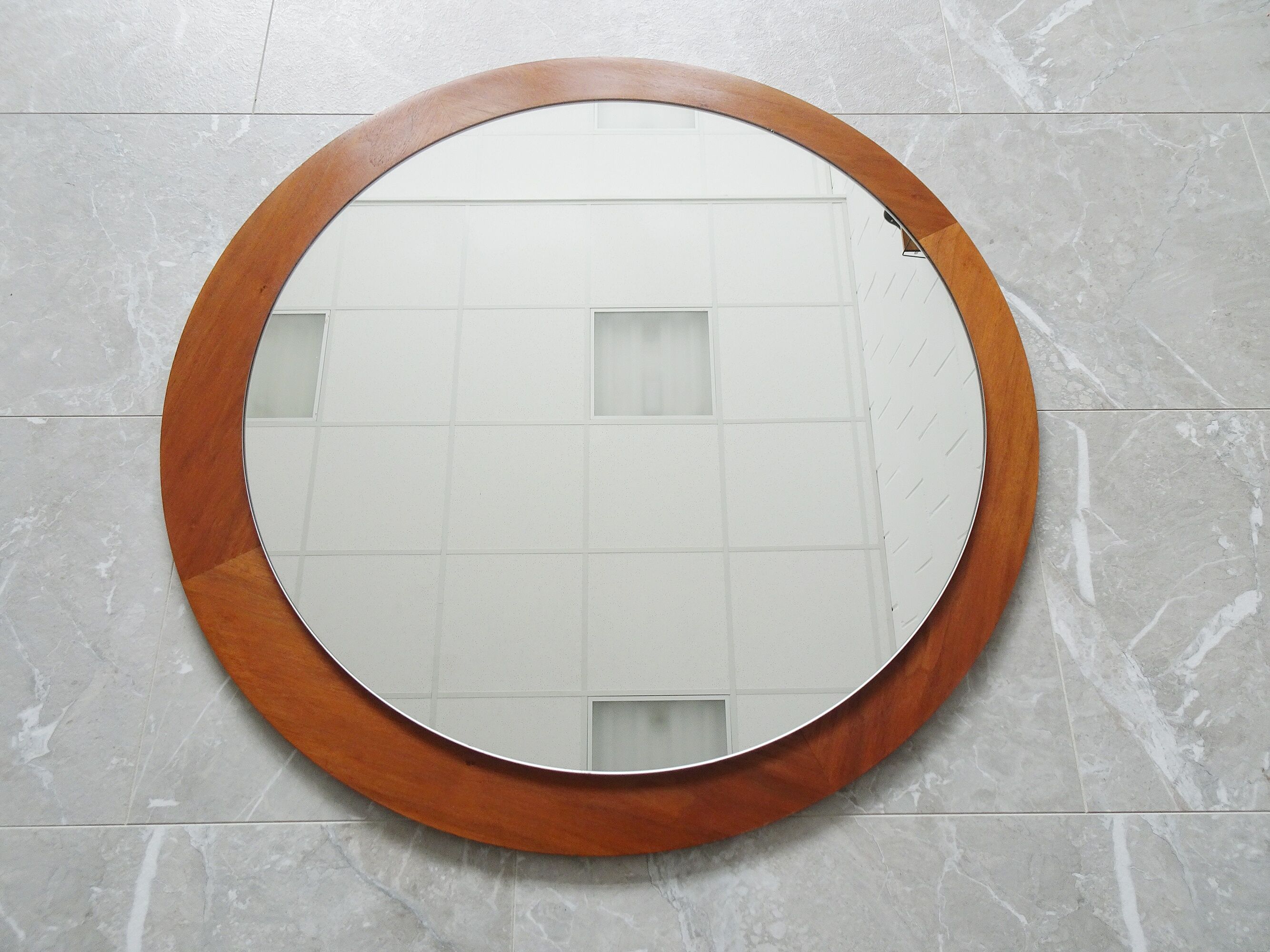 round teak mirror