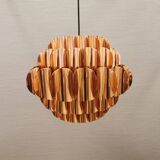 Copper colored hanging lamp. designed by thorsten orrling sweden
