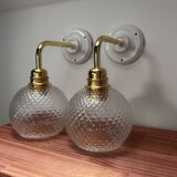 Pair of chiseled glass wall sconces