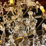 Large chandelier with tassels and old daggers