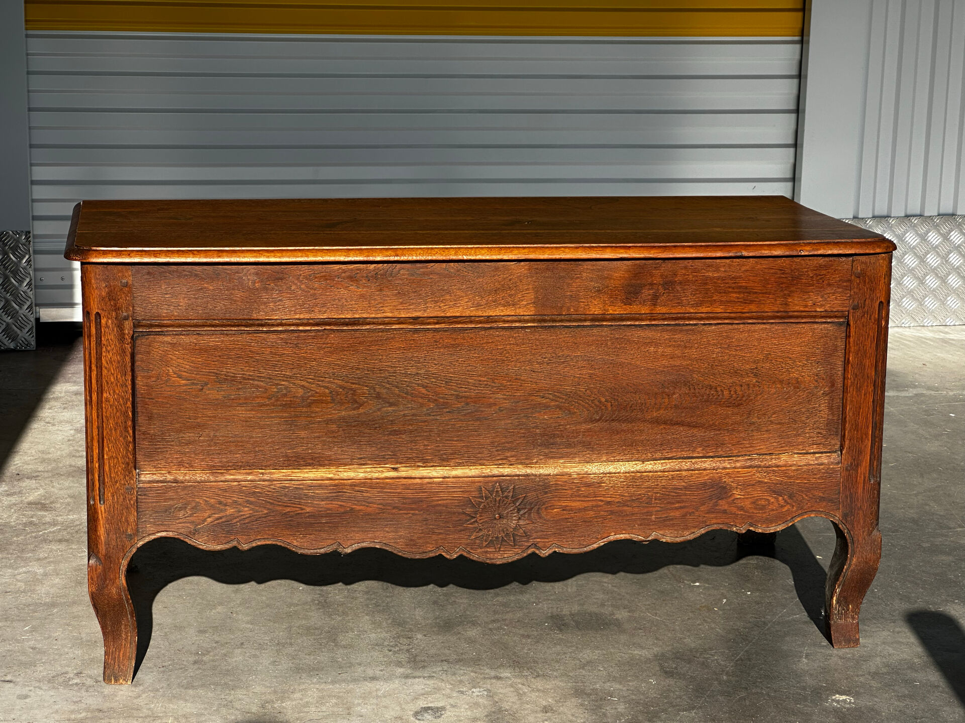French provincial chest in carved and pegged solid oak, 18th century.