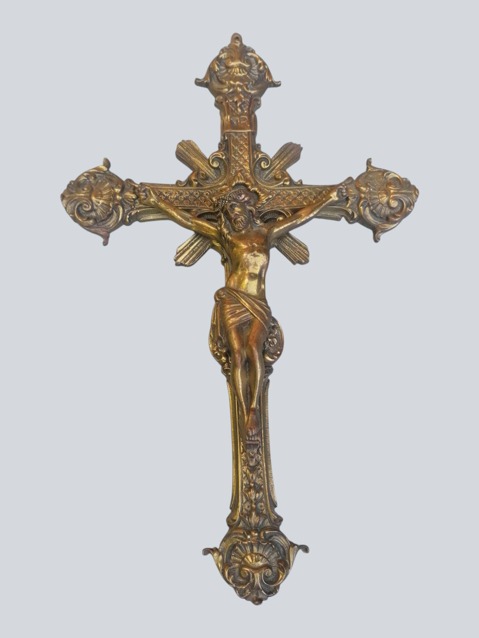 Ornate engraved brass crucifix, Christian cross, Jesus Christ.
