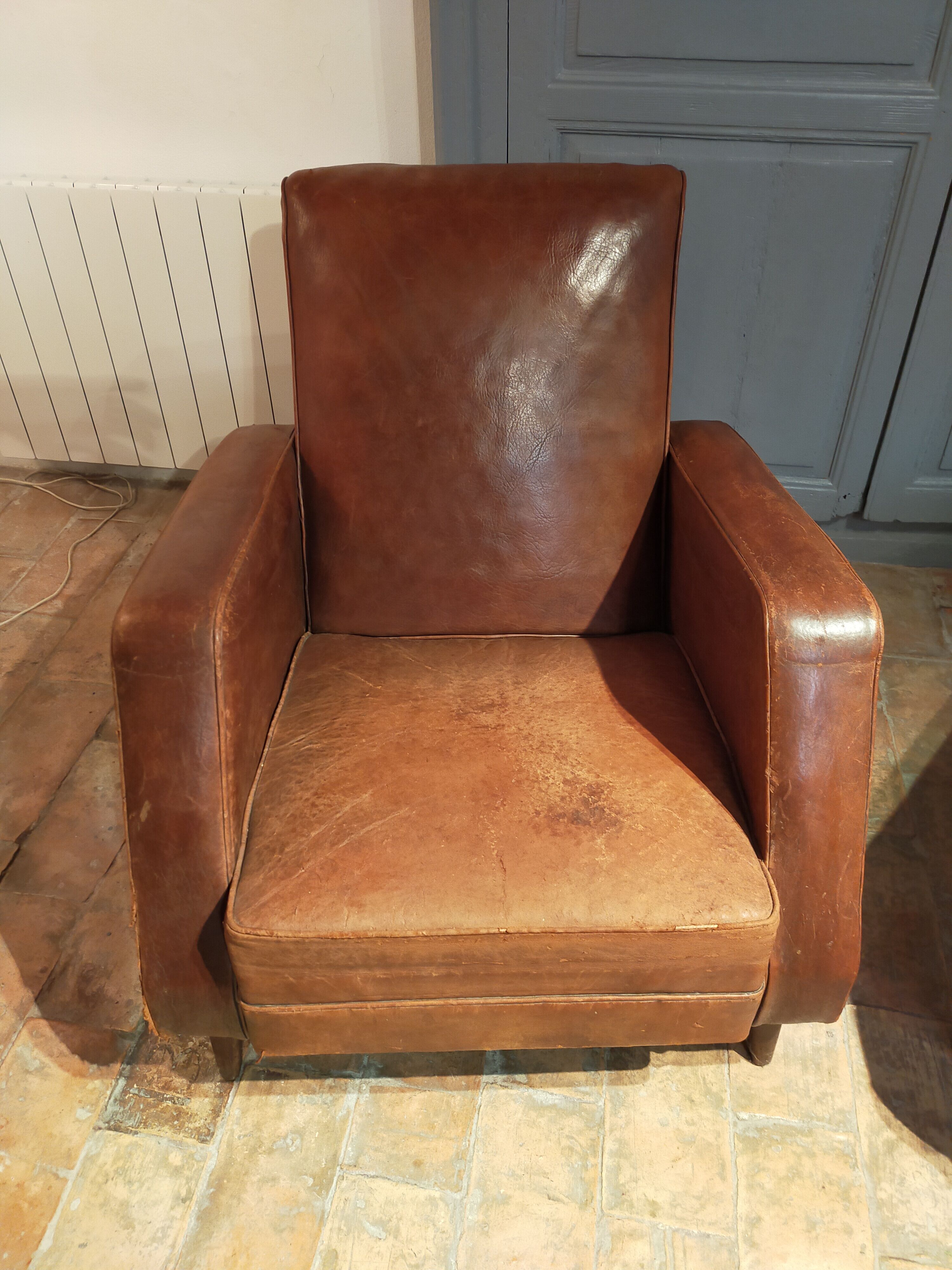 Paire de fauteuils cuir
