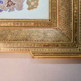Oriental frame with painting on medallion