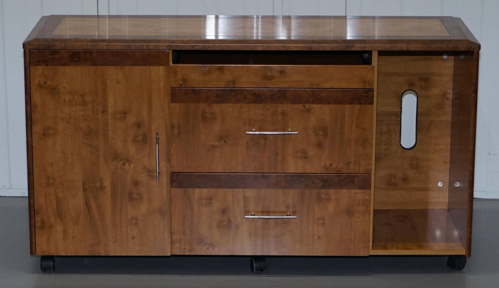 Walnut Burr buffet with drawers and wheels, part of a set.