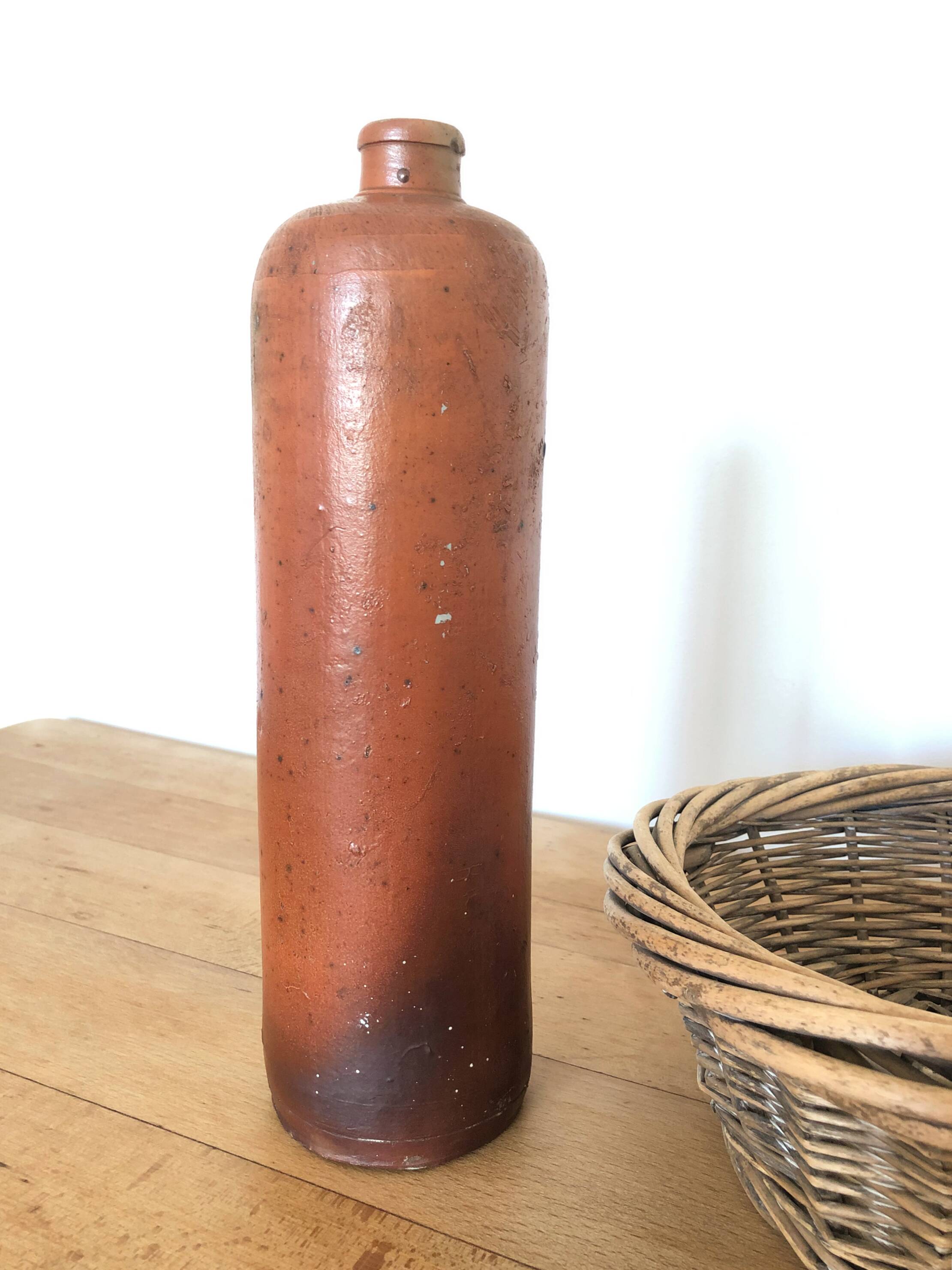 Set of 5 antique glazed stoneware bottles