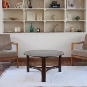 Round coffee table in rattan and smoked glass — 1970s