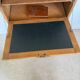Vintage wooden secretary desk in the style of a professional piece of furniture