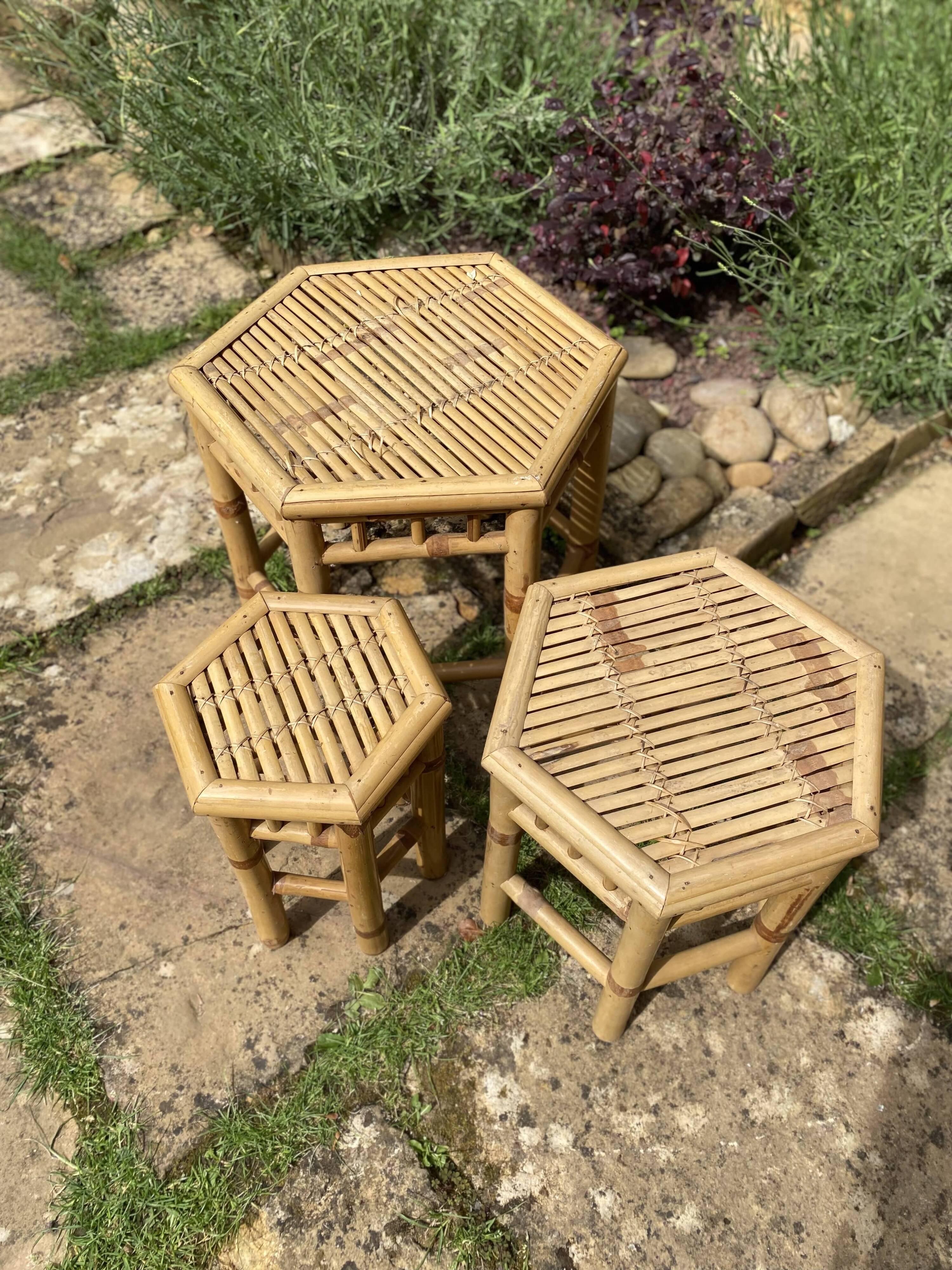 Set of three vintage rattan side tables.