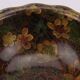 Vintage Asian brass bowl with floral decoration.