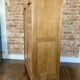 Double curtain filing cabinet in oak — on legs