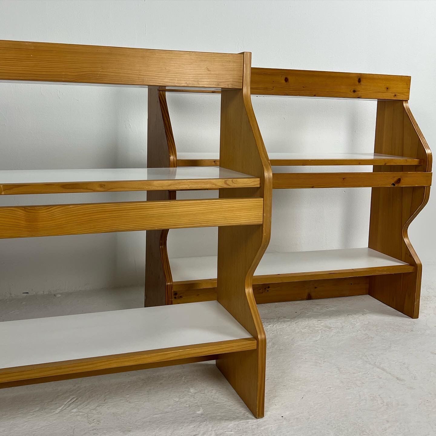Duo of shelves by Charlotte Perriand