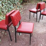 Série de 4 chaises rouges en skaï années 50