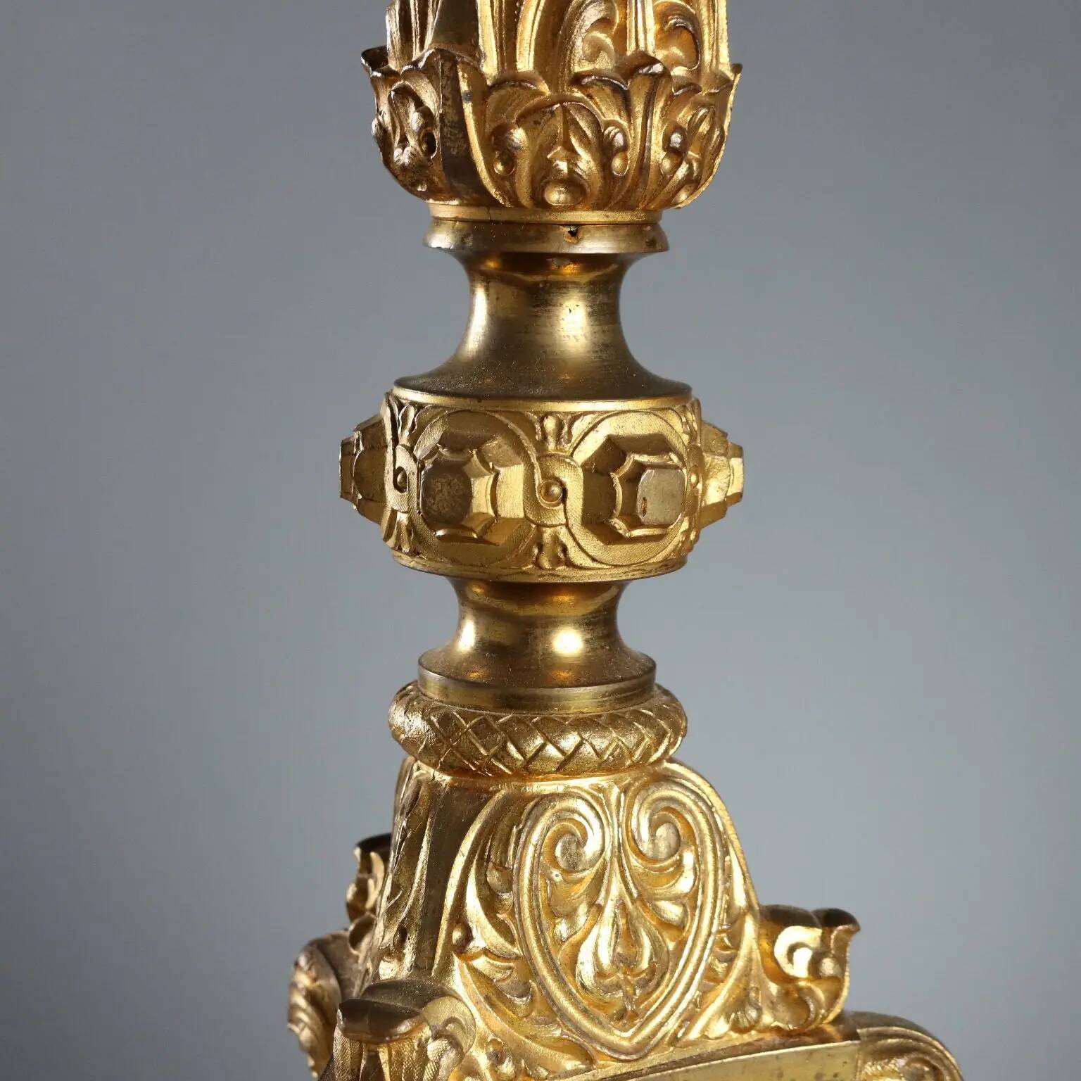 Antique gilded bronze candelabrum, 19th-century decorations.
