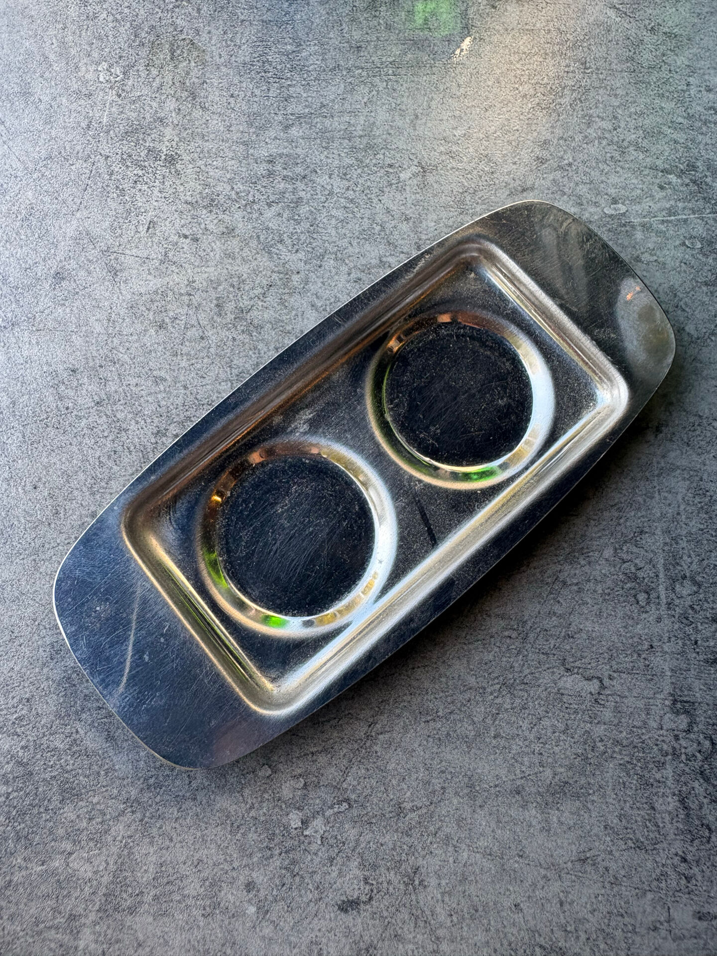 Vintage glass and chrome salt and pepper shaker set.
