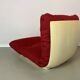 Vintage red shell lounge chairs from the 70s mid-century retro.