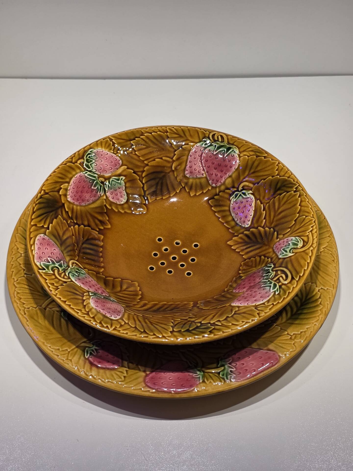 Fruit strainer in Barbotine and serving dish from Salin les Bains.