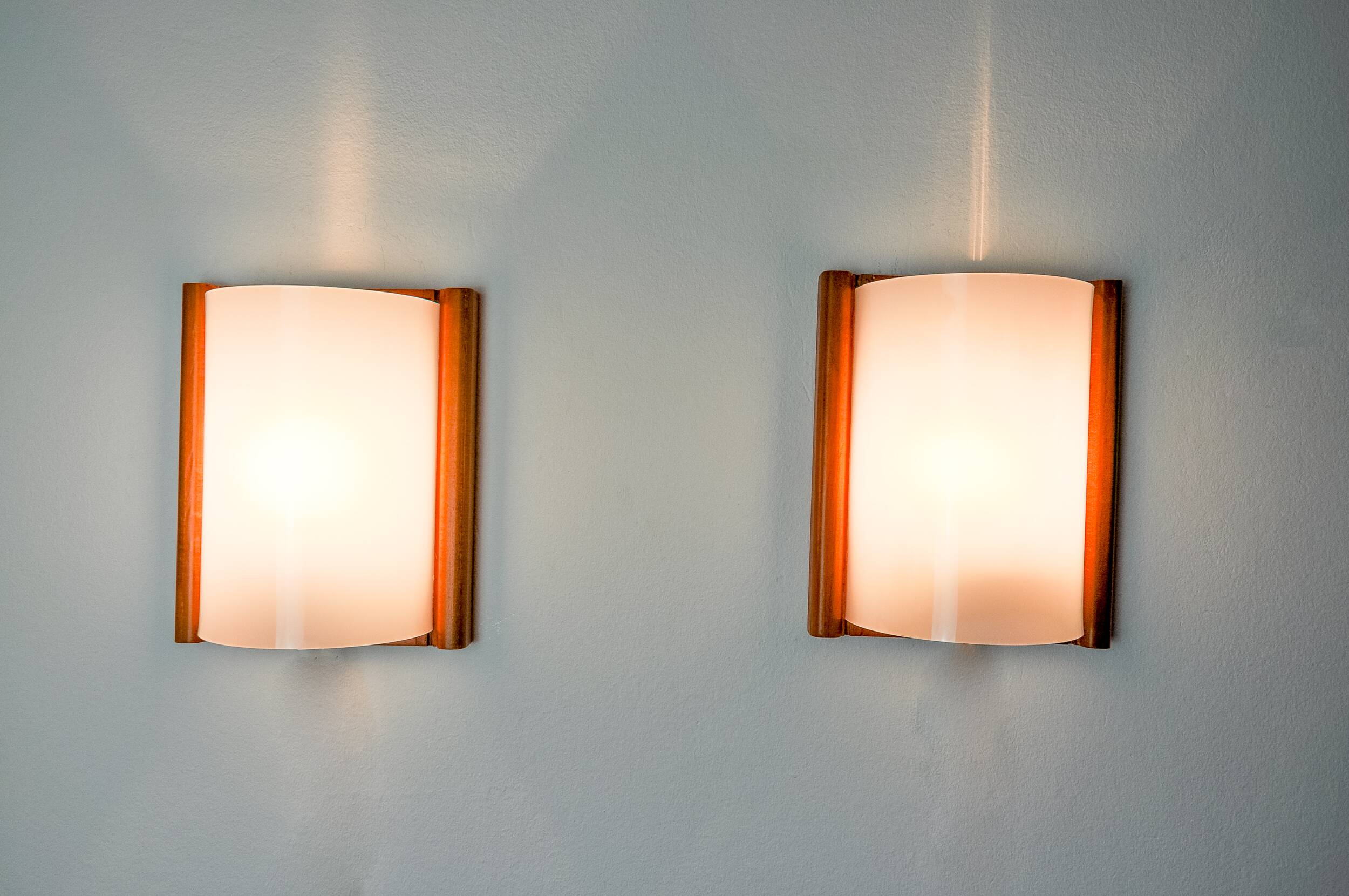 Pair of pine and methacrylate wall lights, spain 1980