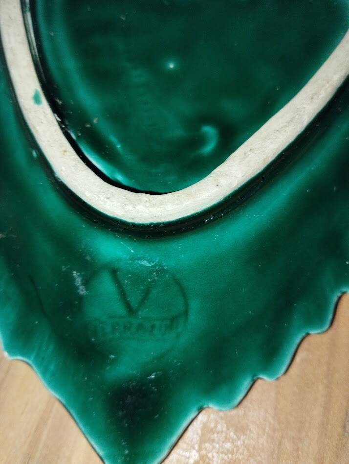 Charming ceramic dish in the shape of a leaf, signed Vallauris, in