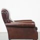 Fauteuil anglais ancien en cuir de mouton