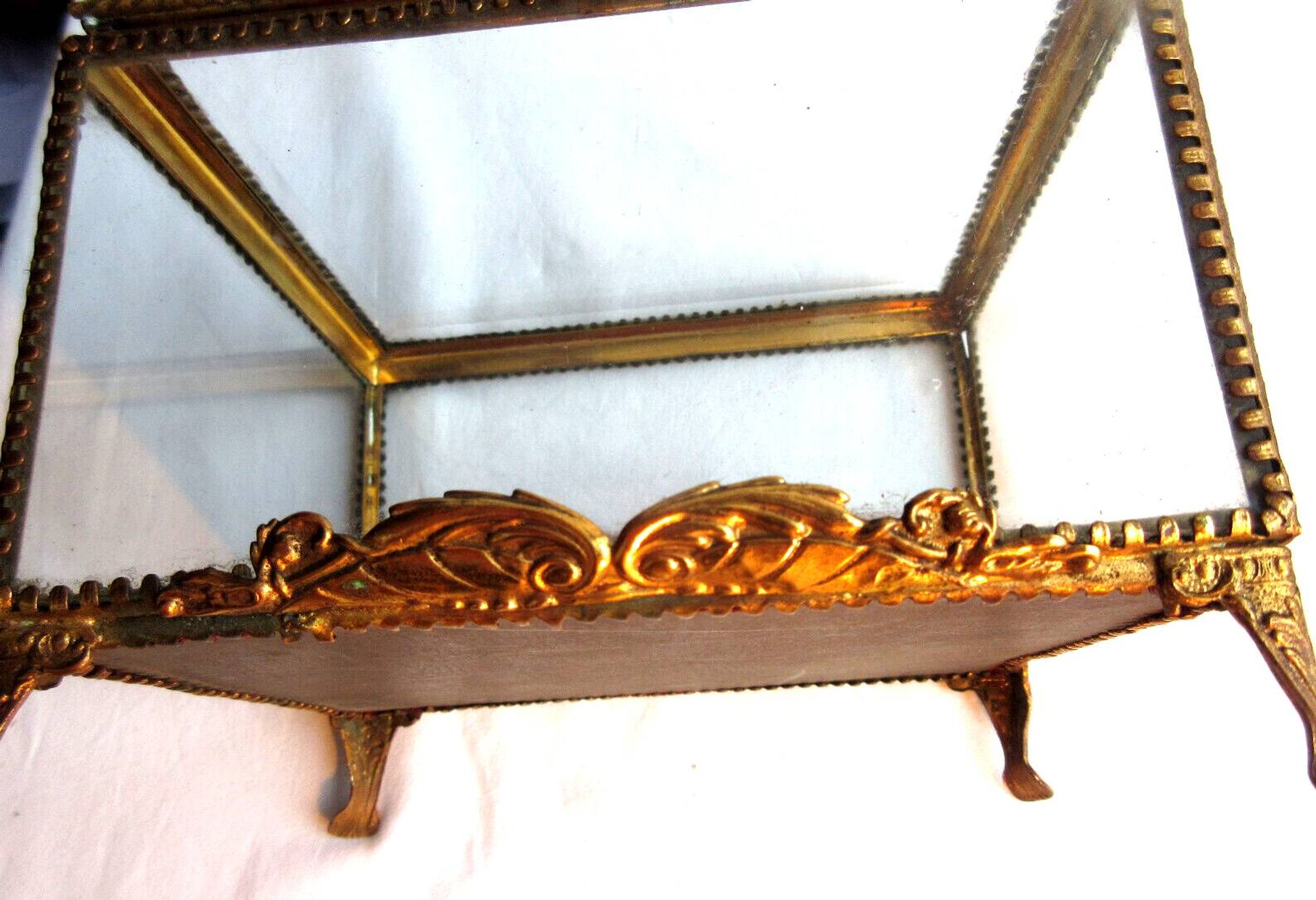 Napoleon III jewelry box, beveled glass and gilded brass, red padded, 4 feet