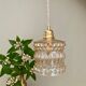 Suspension globe vintage en verre moulé ambré