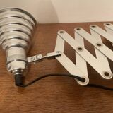Industrial accordion wall light