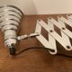 Industrial accordion wall light