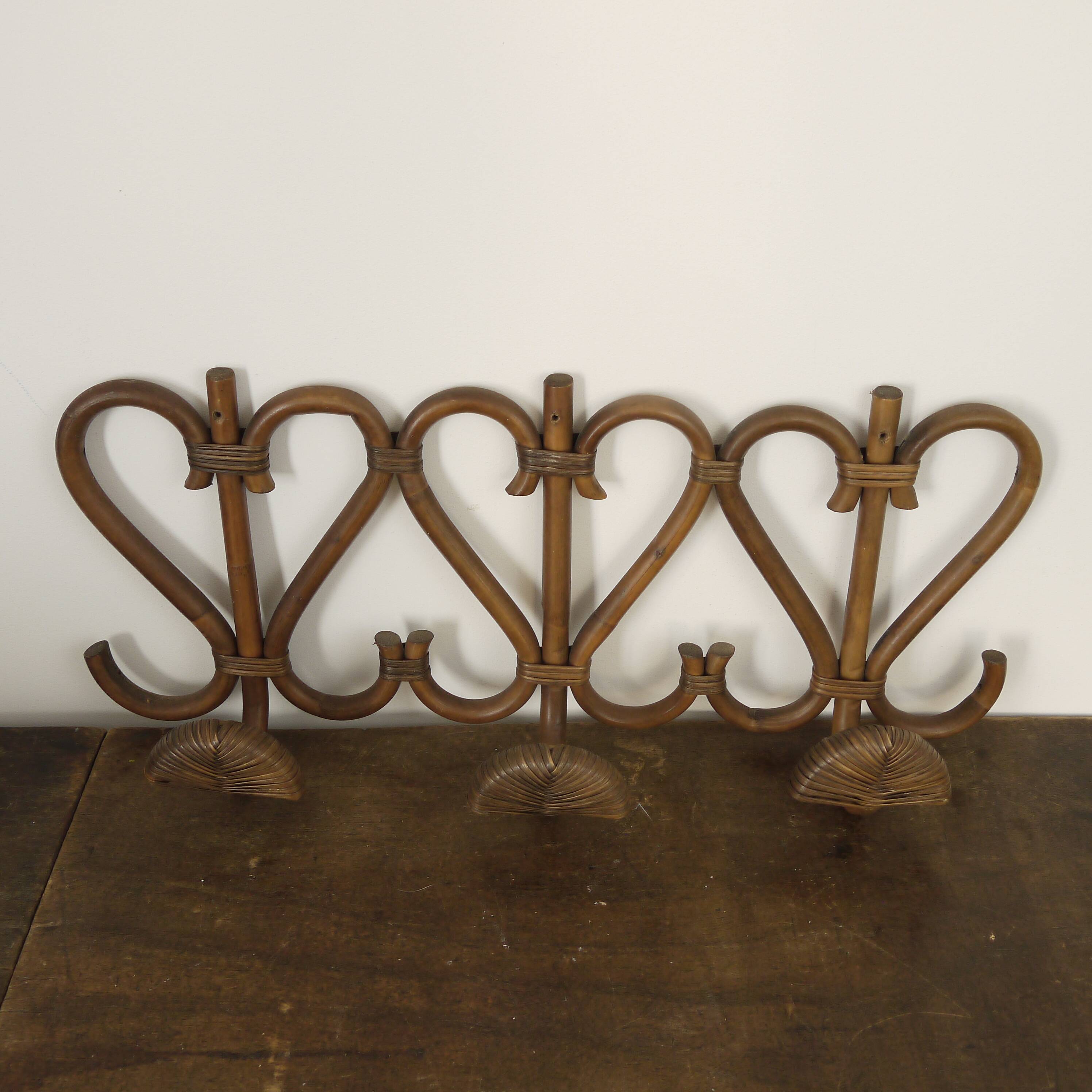 Rattan coat hanger
