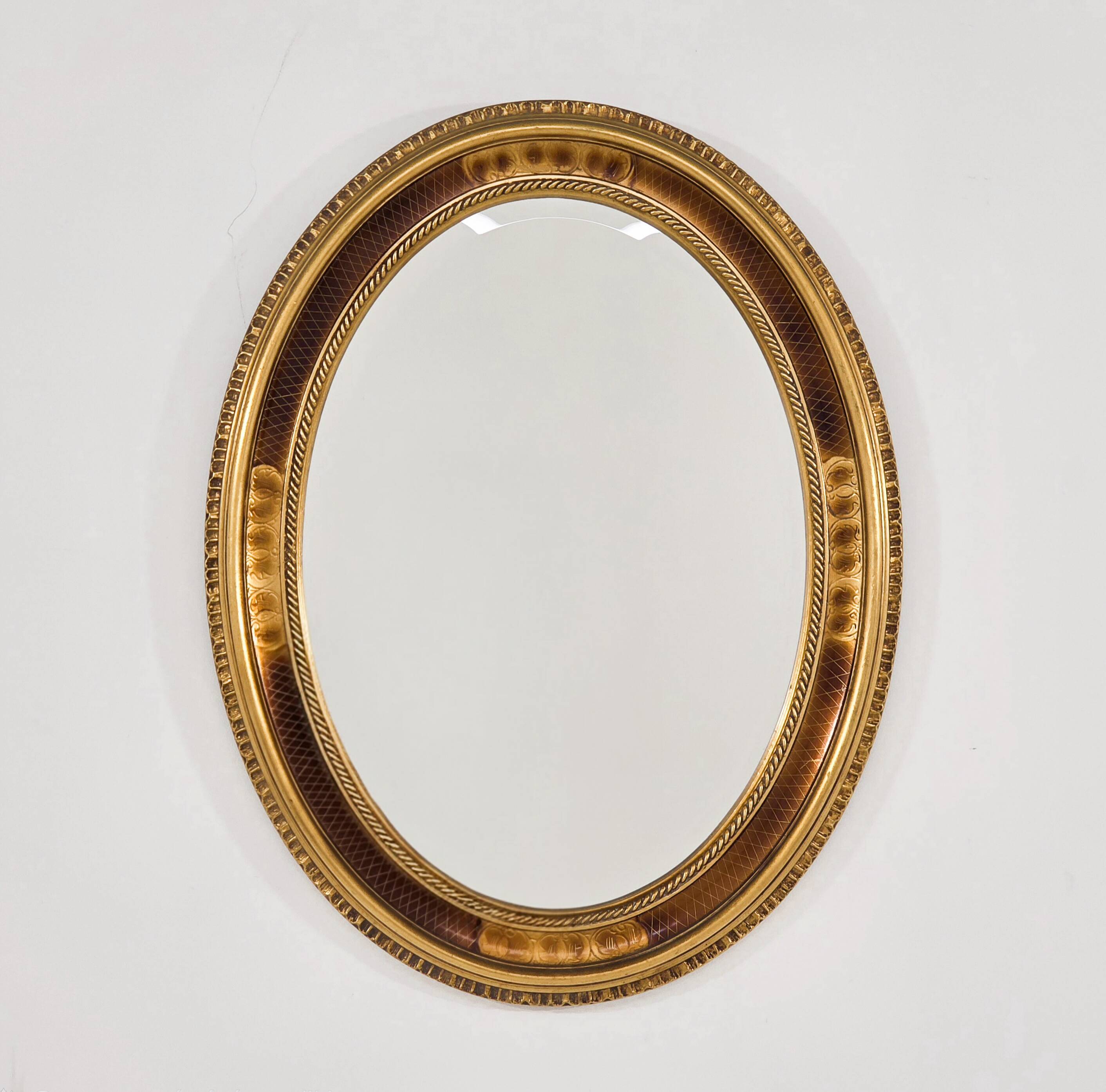 Paire de miroirs médaillon de style Louis XV