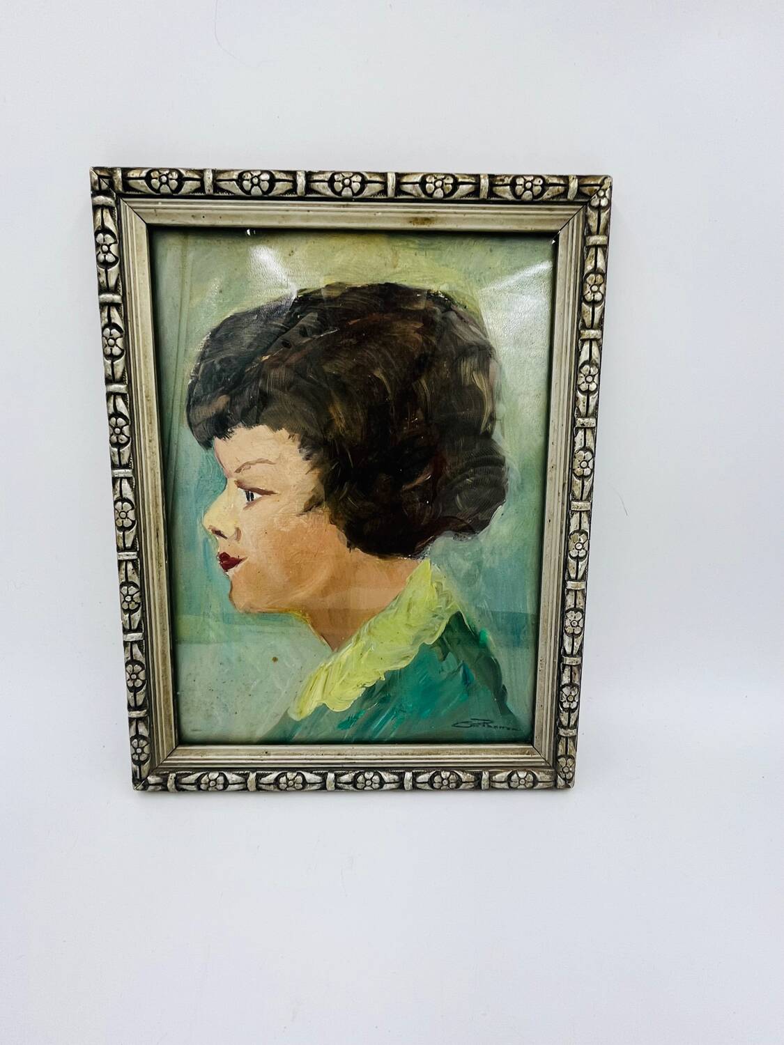 Painting head of a woman signed