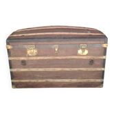 Large domed trunk from the 1900s signed Moynat Paris made of wood.
