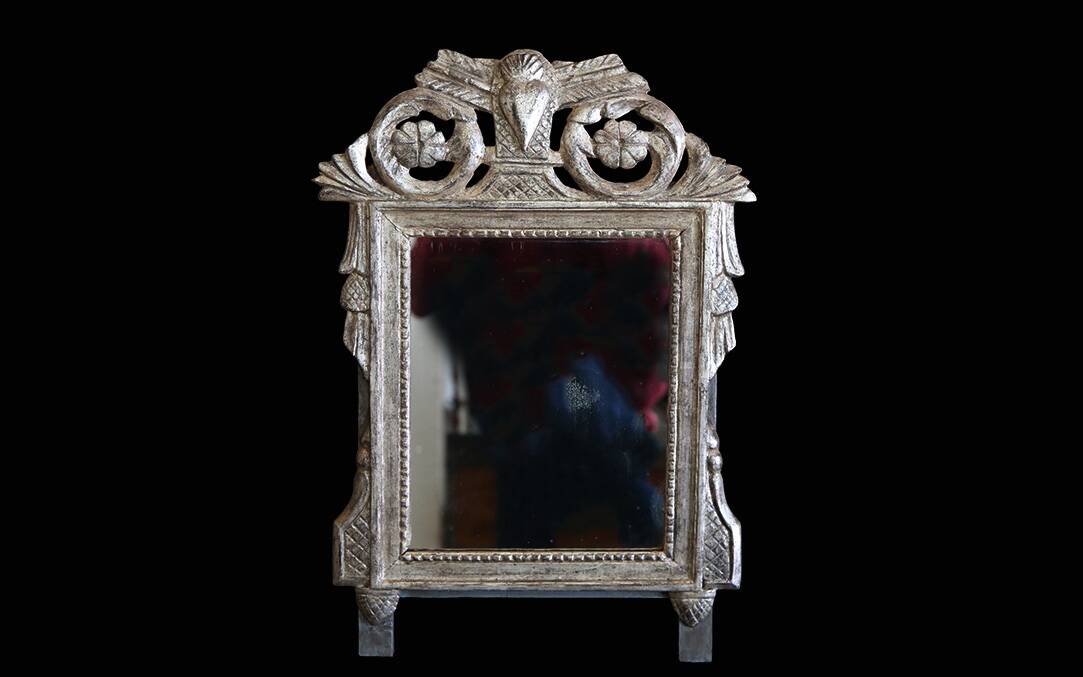 Small mirror, silver-leafed wood